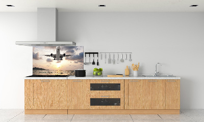 Salpicadero para cocina Un avión sobre el mar