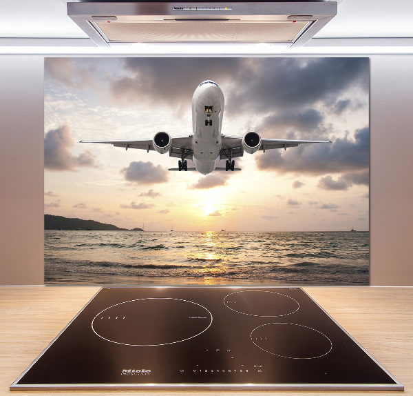 Salpicadero para cocina Un avión sobre el mar