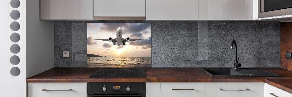 Salpicadero para cocina Un avión sobre el mar