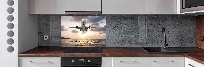 Salpicadero para cocina Un avión sobre el mar