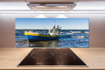 Panel de pared de cocina Un cúter en el mar