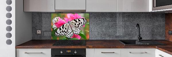 Panel antisalpicaduras Mariposa en una flor