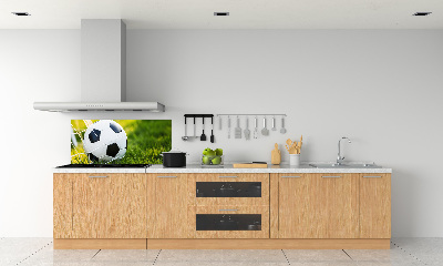 Panel antisalpicaduras El balón está en la portería.