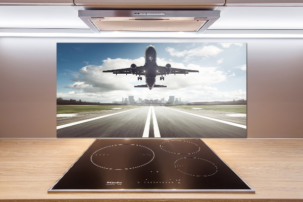 Salpicadero para cocina Un avión despegando