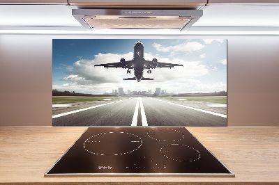 Salpicadero para cocina Un avión despegando