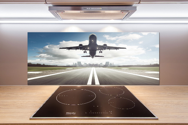 Salpicadero para cocina Un avión despegando