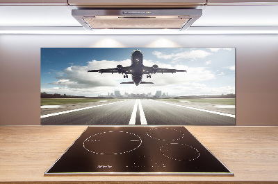 Salpicadero para cocina Un avión despegando