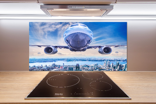Salpicadero para cocina Un avión sobre la ciudad