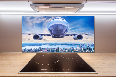 Salpicadero para cocina Un avión sobre la ciudad