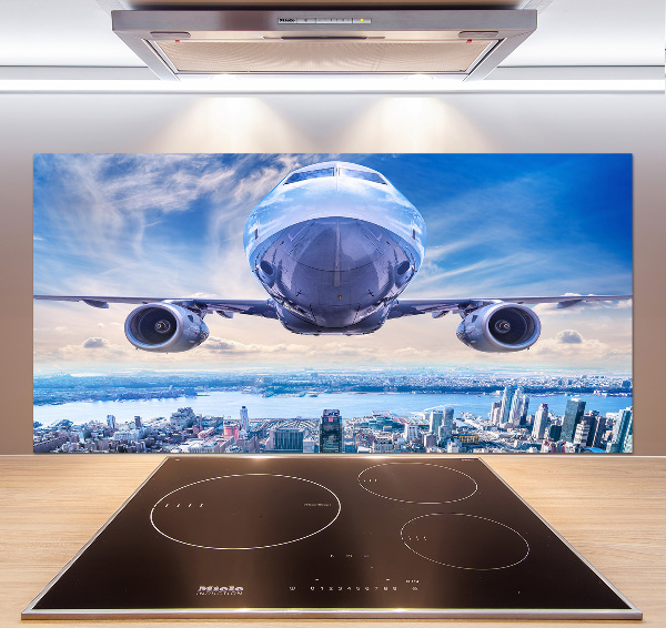 Salpicadero para cocina Un avión sobre la ciudad