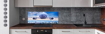 Salpicadero para cocina Un avión sobre la ciudad