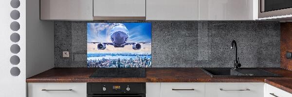 Salpicadero para cocina Un avión sobre la ciudad