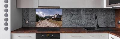 Panel de pared de cocina Una cabaña en las montañas