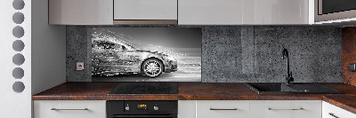 Panel antisalpicaduras Un coche a toda velocidad