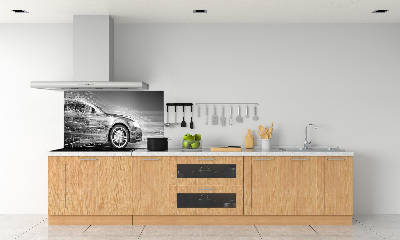 Panel antisalpicaduras Un coche a toda velocidad