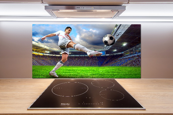 Panel de pared de cocina Un jugador de fútbol en el estadio.