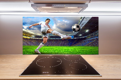 Panel de pared de cocina Un jugador de fútbol en el estadio.