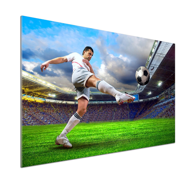 Panel de pared de cocina Un jugador de fútbol en el estadio.