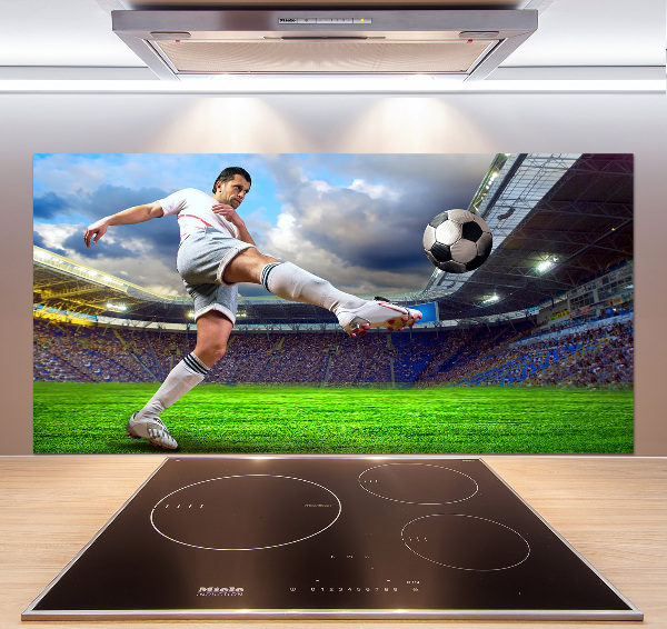 Panel de pared de cocina Un jugador de fútbol en el estadio.