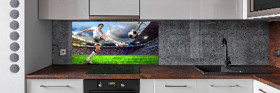 Panel de pared de cocina Un jugador de fútbol en el estadio.