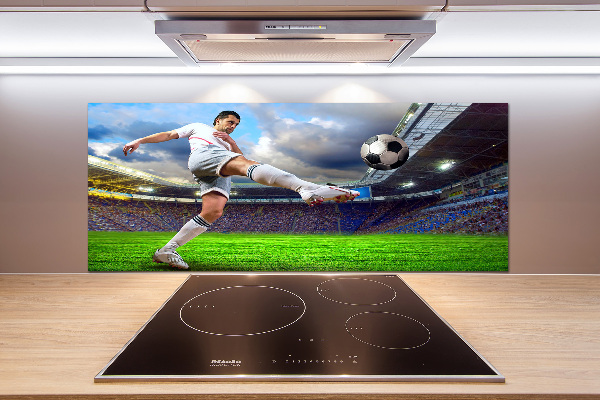 Panel de pared de cocina Un jugador de fútbol en el estadio.