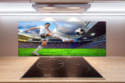 Panel de pared de cocina Un jugador de fútbol en el estadio.