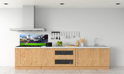 Panel de pared de cocina Un jugador de fútbol en el estadio.