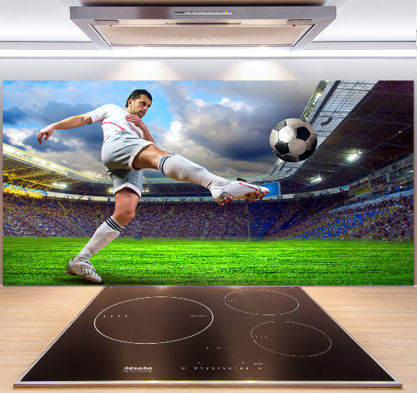 Panel de pared de cocina Un jugador de fútbol en el estadio.