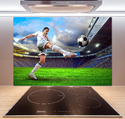 Panel de pared de cocina Un jugador de fútbol en el estadio.