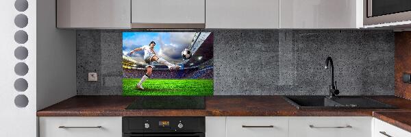 Panel de pared de cocina Un jugador de fútbol en el estadio.