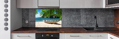 Salpicadero para cocina Un barco en la playa