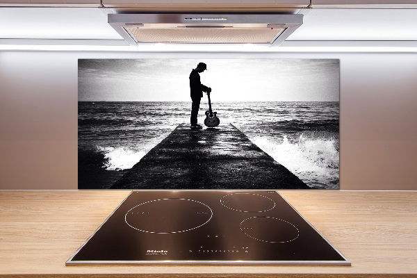 Salpicadero de cocina Guitarrista en el muelle