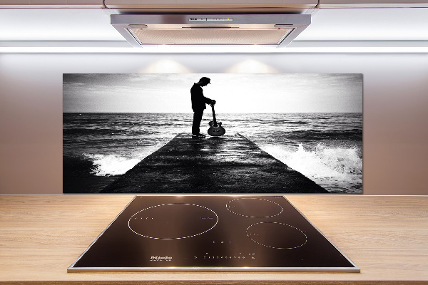 Salpicadero de cocina Guitarrista en el muelle