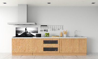 Salpicadero de cocina Guitarrista en el muelle