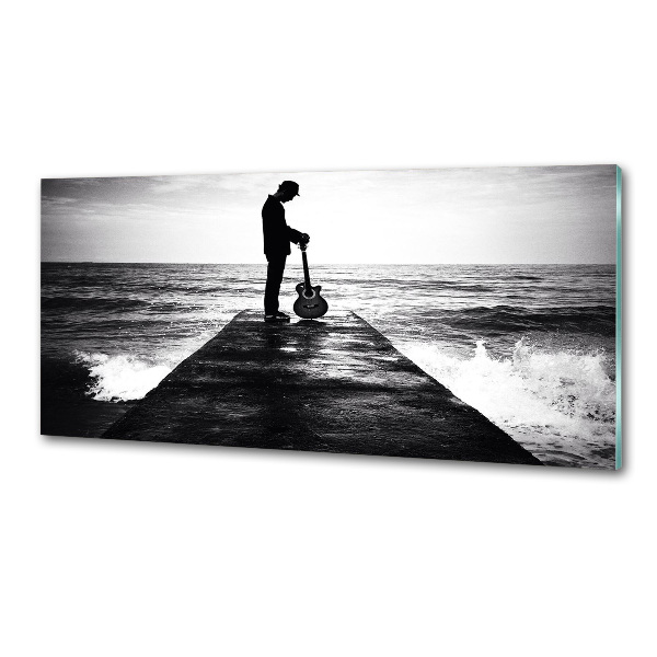 Salpicadero de cocina Guitarrista en el muelle