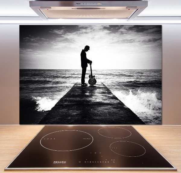 Salpicadero de cocina Guitarrista en el muelle