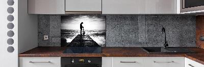 Salpicadero de cocina Guitarrista en el muelle