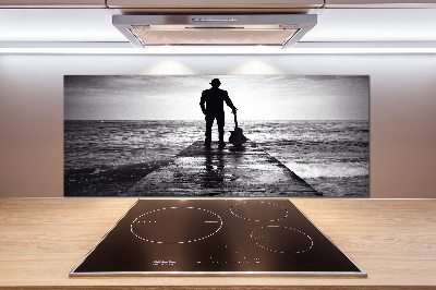 Panel antisalpicaduras Guitarrista en el muelle