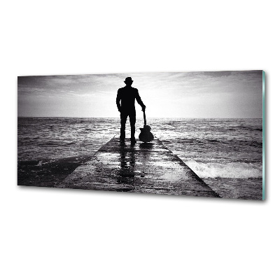 Panel antisalpicaduras Guitarrista en el muelle