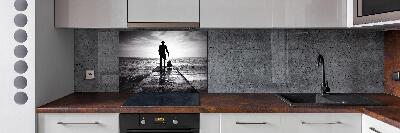 Panel antisalpicaduras Guitarrista en el muelle