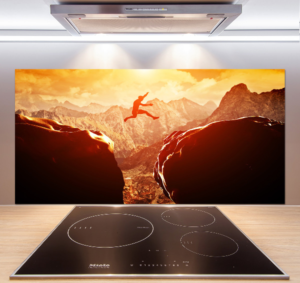 Panel antisalpicaduras Saltar sobre el abismo