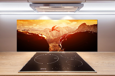 Panel antisalpicaduras Saltar sobre el abismo