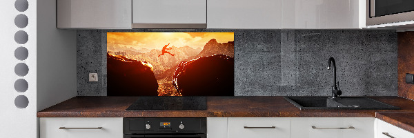 Panel antisalpicaduras Saltar sobre el abismo