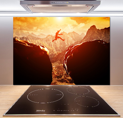 Panel antisalpicaduras Saltar sobre el abismo