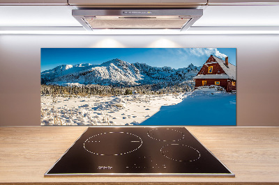 Panel de pared de cocina Una cabaña en las montañas