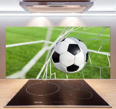 Panel antisalpicaduras El balón está en la portería.