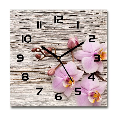 Reloj cuadrado Orquídea sobre madera
