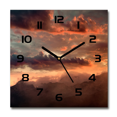 Reloj cuadrado Puesta de sol sobre las montañas