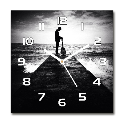 Reloj cuadrado Guitarrista en el muelle