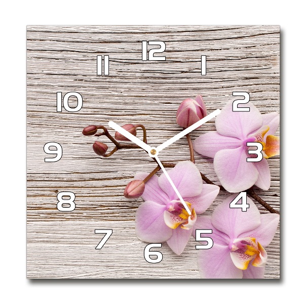 Reloj cuadrado Orquídea sobre madera